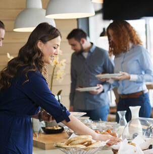 people getting food in a hotel